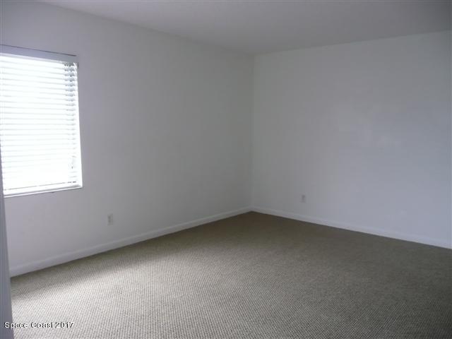 3213 Murrell Road, Unit 106 Rockledge, FL 32955 - Photo 8 of 14 MASTER BEDROOM