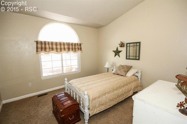 12475 Snaffle Bit Road Peyton, CO 80831 - Photo 23 of 35 3rd Bedroom-On Main Floor