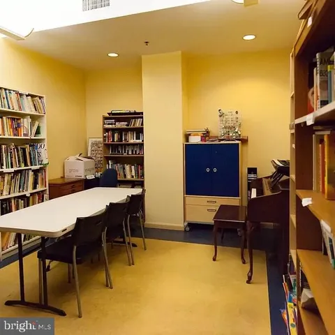 a view of a workspace with furniture