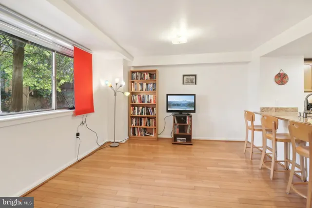 a view of a livingroom with furniture and window