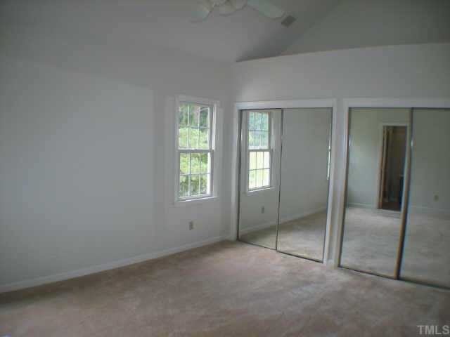 1808 Park Ridge Way Raleigh, NC 27614 - Photo 9 of 10 an empty room with sliding door