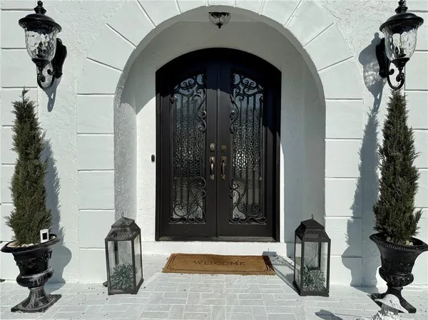 a view of a dining room with furniture and window