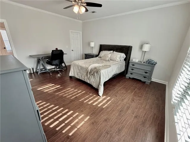 a view of an empty room and fire place