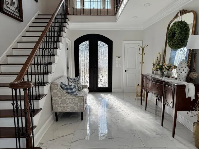 a living room with furniture fireplace and a flat screen tv