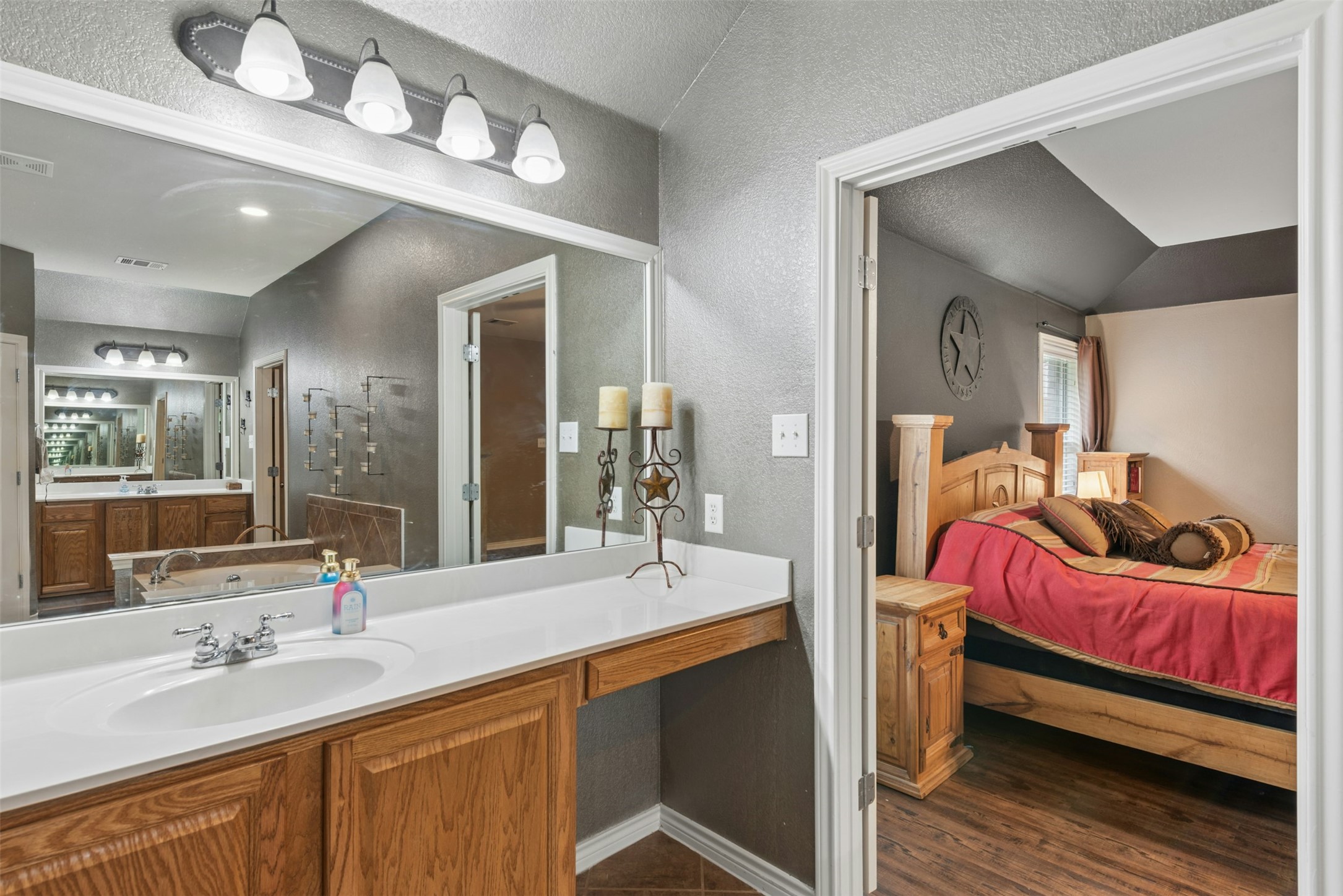 30013 Edgewood Drive Georgetown, TX 78628 - Photo 21 of 39 This vanity features a place for a chair for applying make-up and drying hair. Double doors can be closed to Primary Bedroom.