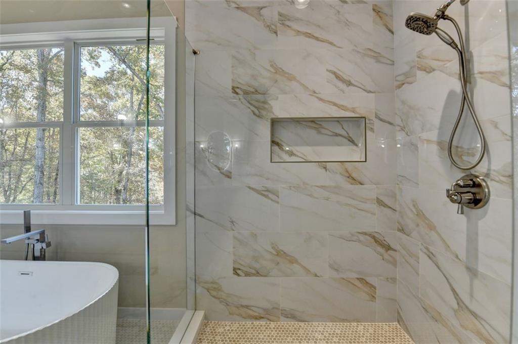 2881 Traditions Way Jefferson, GA 30549 - Photo 20 of 59 a bathroom with a shower