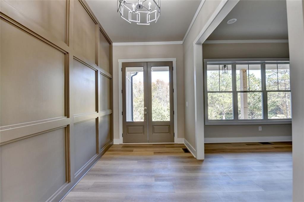 2881 Traditions Way Jefferson, GA 30549 - Photo 3 of 59 a view of room with window and hardwood floor