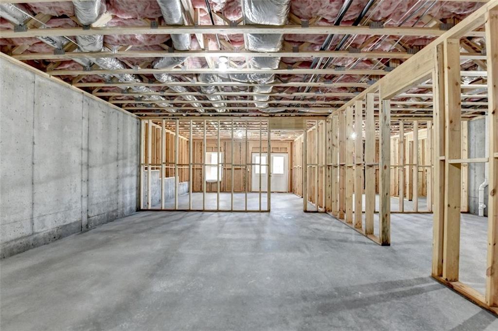 2881 Traditions Way Jefferson, GA 30549 - Photo 36 of 59 a view of a indoor garage