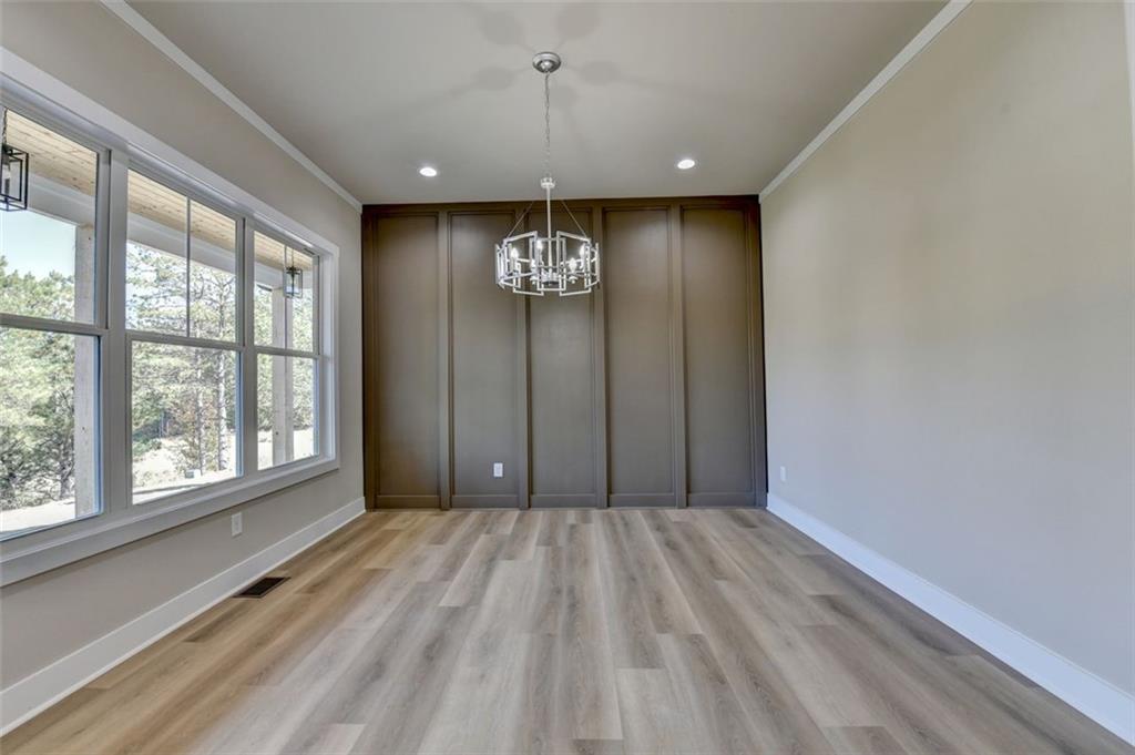 2881 Traditions Way Jefferson, GA 30549 - Photo 4 of 59 a view of an empty room with a window