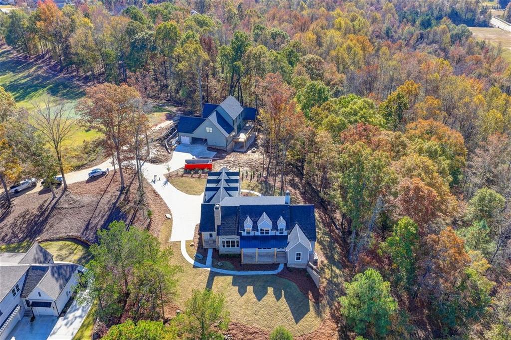2881 Traditions Way Jefferson, GA 30549 - Photo 45 of 59 an aerial view of a house with a yard basket ball court and outdoor seating