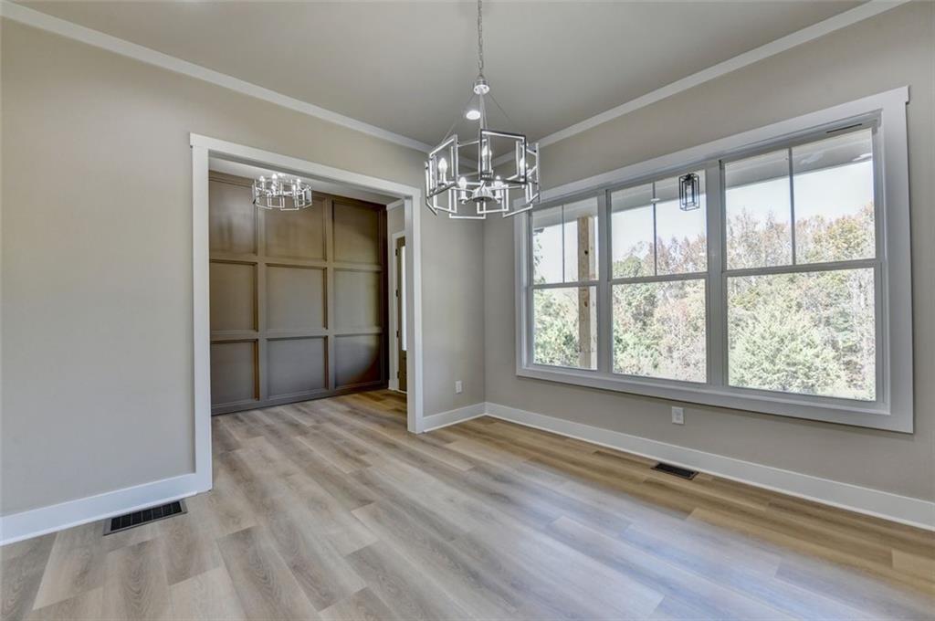 2881 Traditions Way Jefferson, GA 30549 - Photo 5 of 59 a view of livingroom with window