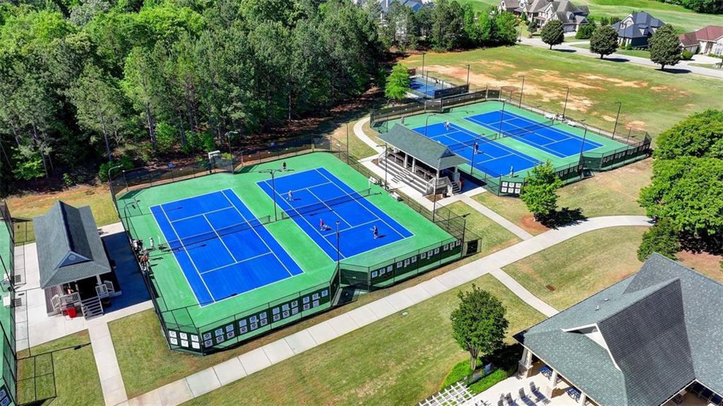 2881 Traditions Way Jefferson, GA 30549 - Photo 58 of 59 a view of a tennis ground with large trees