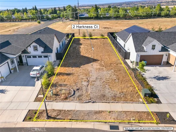 an aerial view of a house with swimming pool