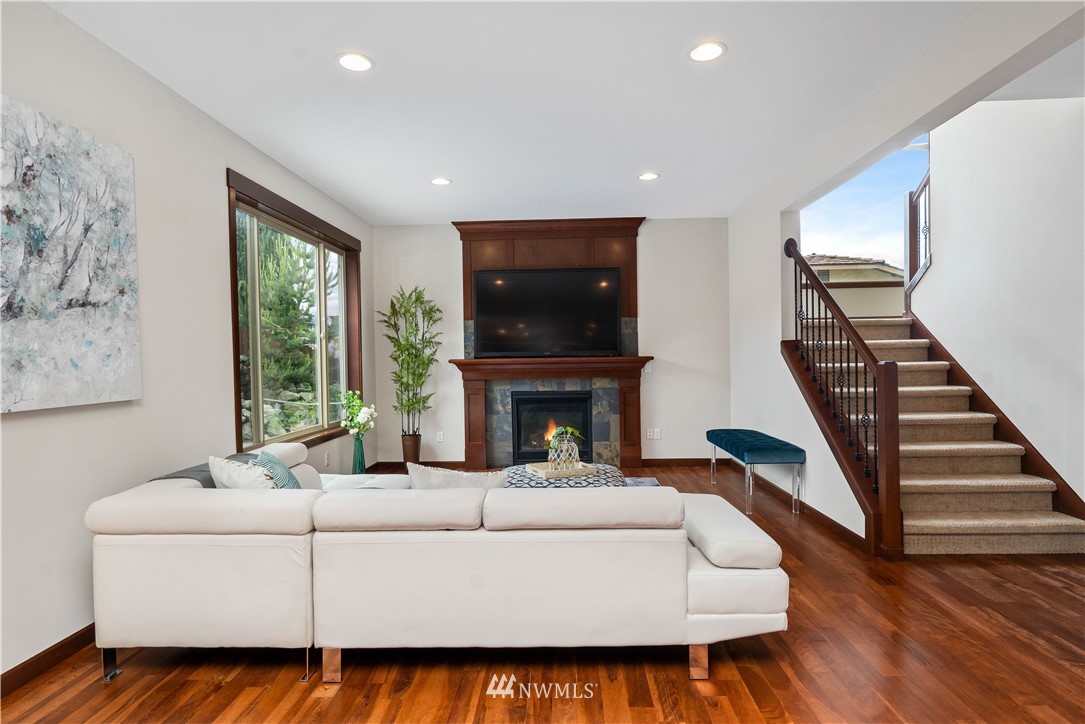 1317 North 40th Street Renton, WA 98056 - Photo 11 of 40 a living room with furniture and a fireplace
