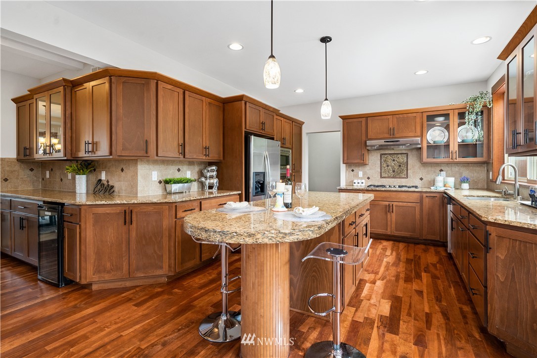 1317 North 40th Street Renton, WA 98056 - Photo 14 of 40 a kitchen with a sink appliances and cabinets