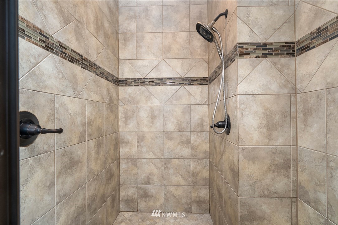 1317 North 40th Street Renton, WA 98056 - Photo 23 of 40 a bathroom with a shower