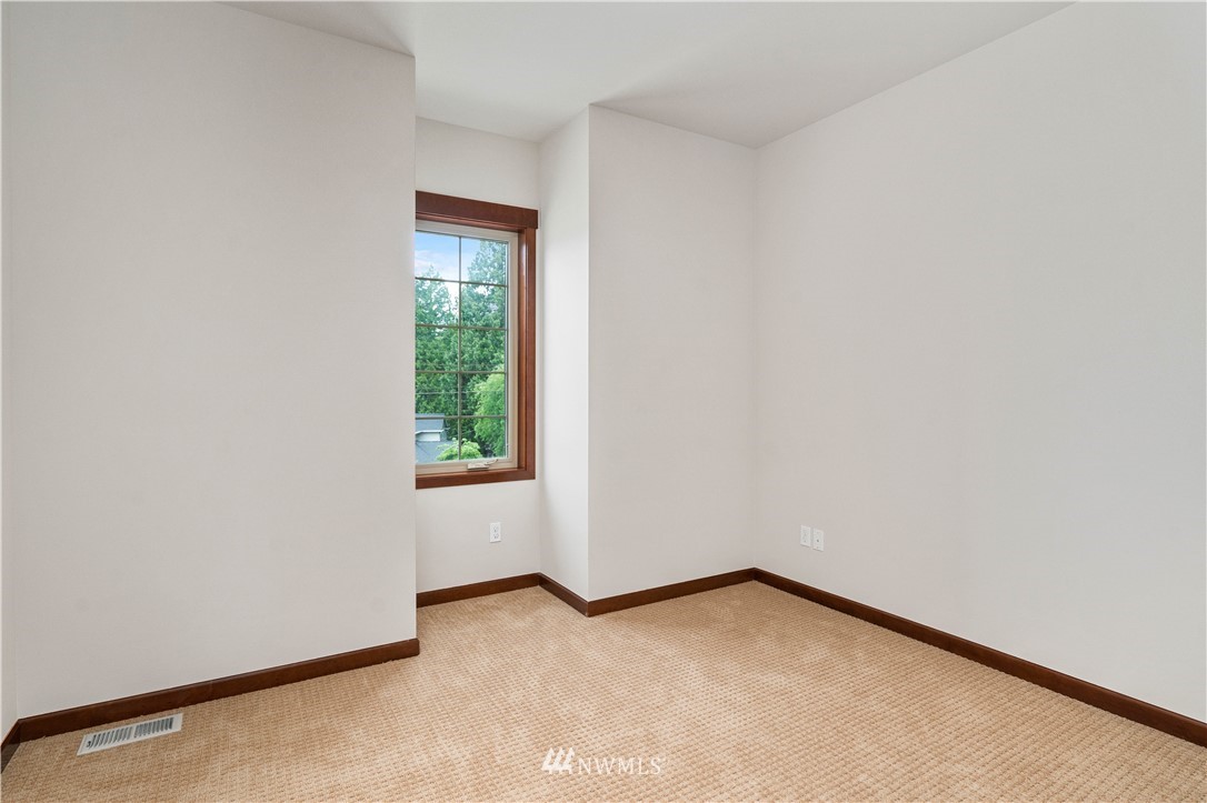 1317 North 40th Street Renton, WA 98056 - Photo 27 of 40 a view of an empty room and window