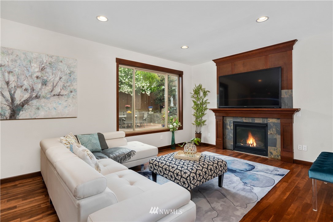 1317 North 40th Street Renton, WA 98056 - Photo 10 of 40 a living room with furniture fireplace and flat screen tv