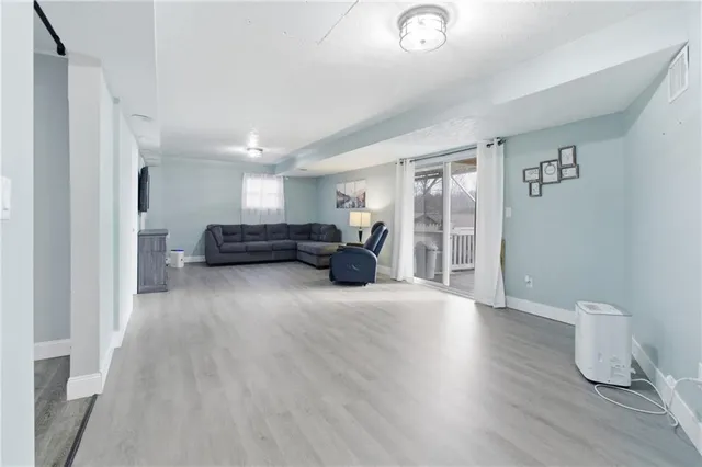 a view of livingroom with furniture and windows