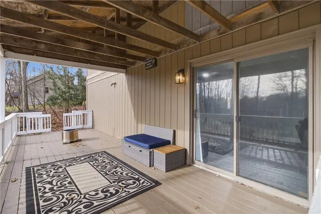a living room with a rug