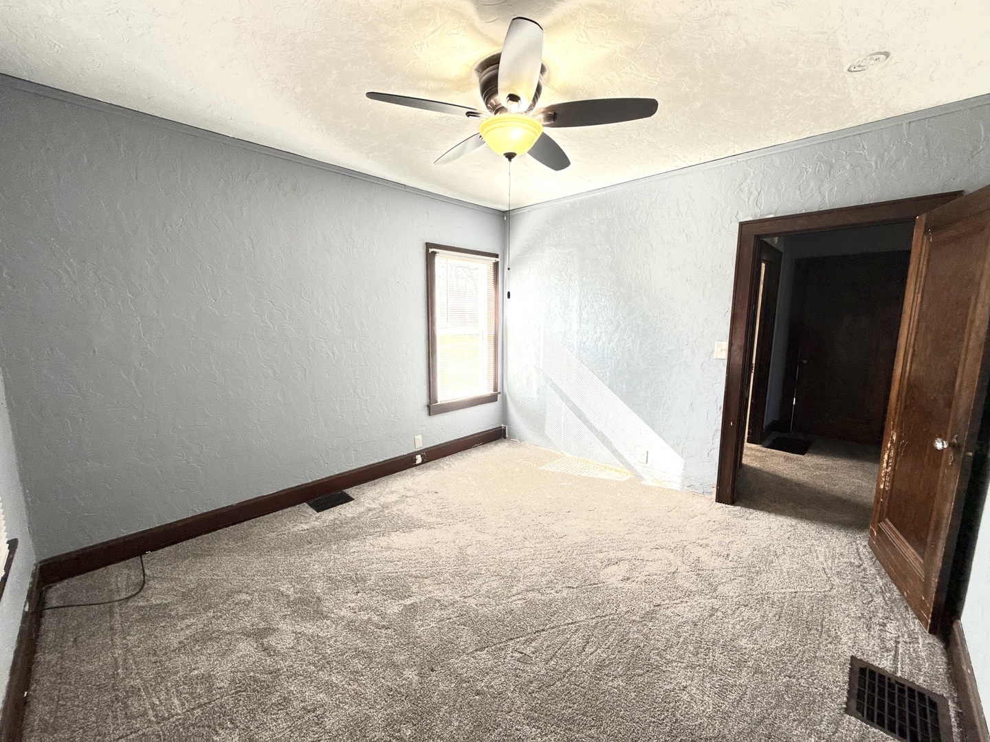 302 West Division Street Amboy, IL 61310 - Photo 18 of 23 a view of an empty room and window