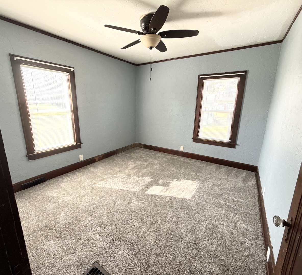 302 West Division Street Amboy, IL 61310 - Photo 19 of 23 a view of an empty room with a window