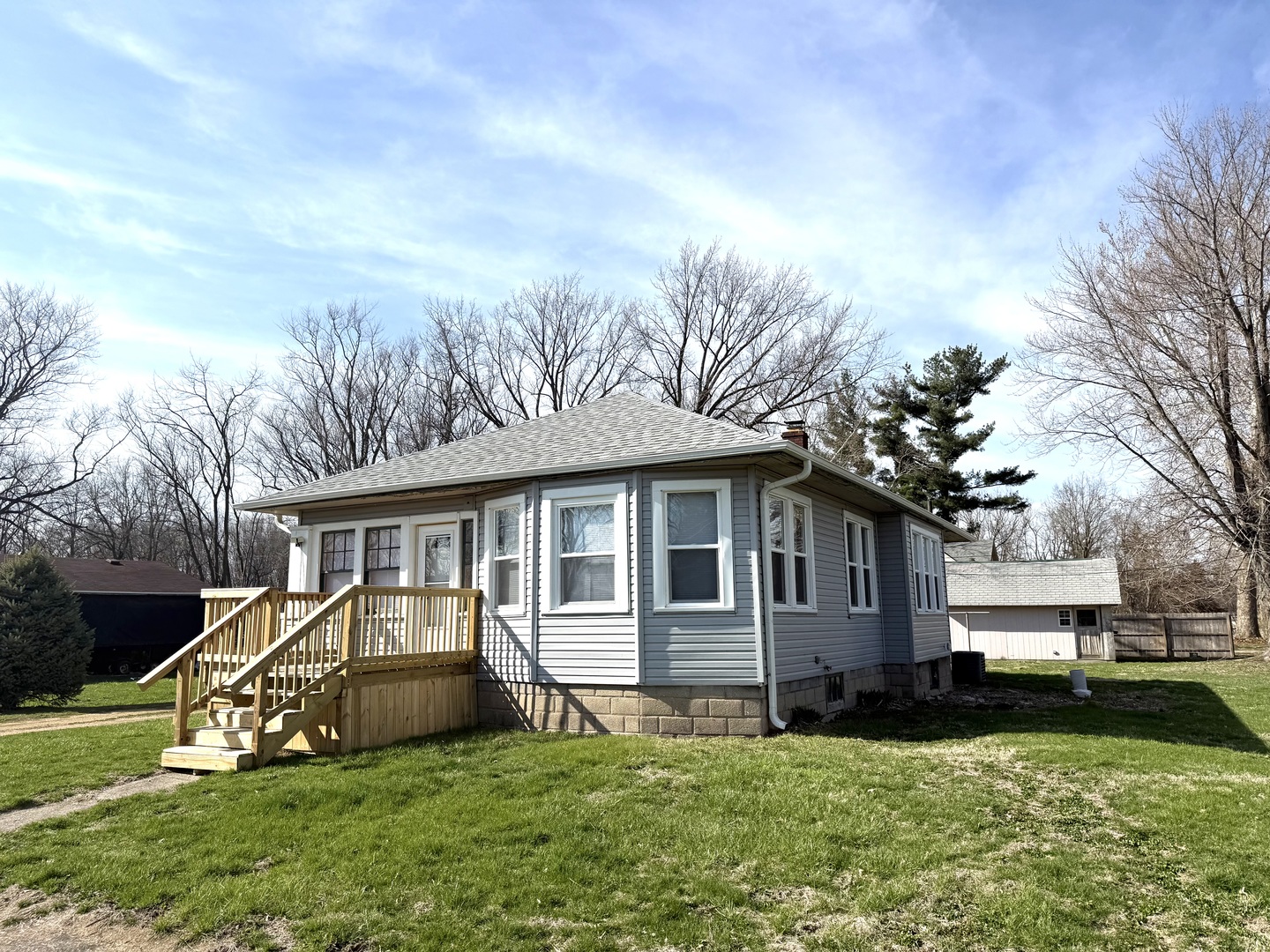 302 West Division Street Amboy, IL 61310 - Photo 2 of 23 a view of a house with a yard