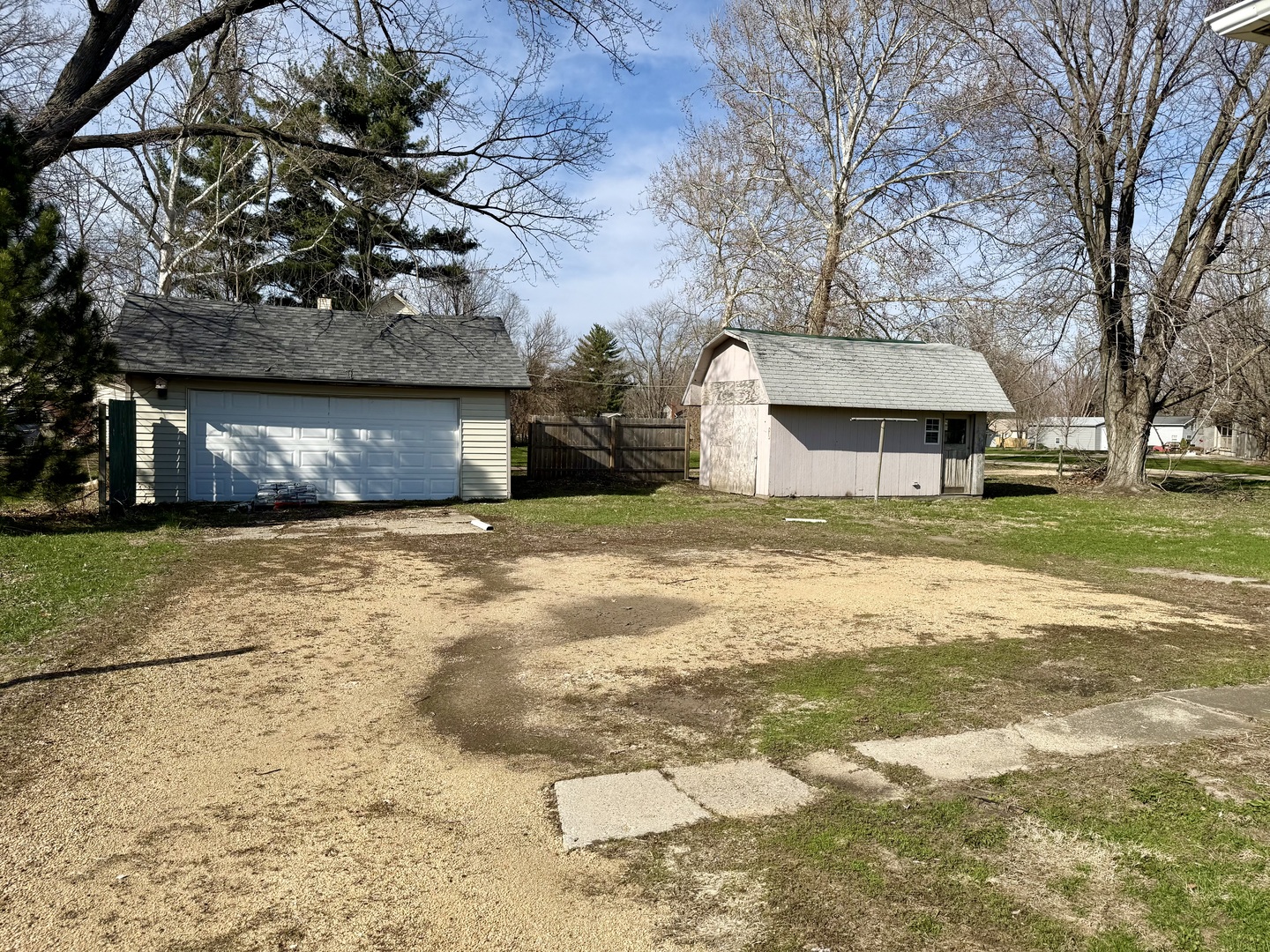 302 West Division Street Amboy, IL 61310 - Photo 4 of 23 a view of a house with a yard