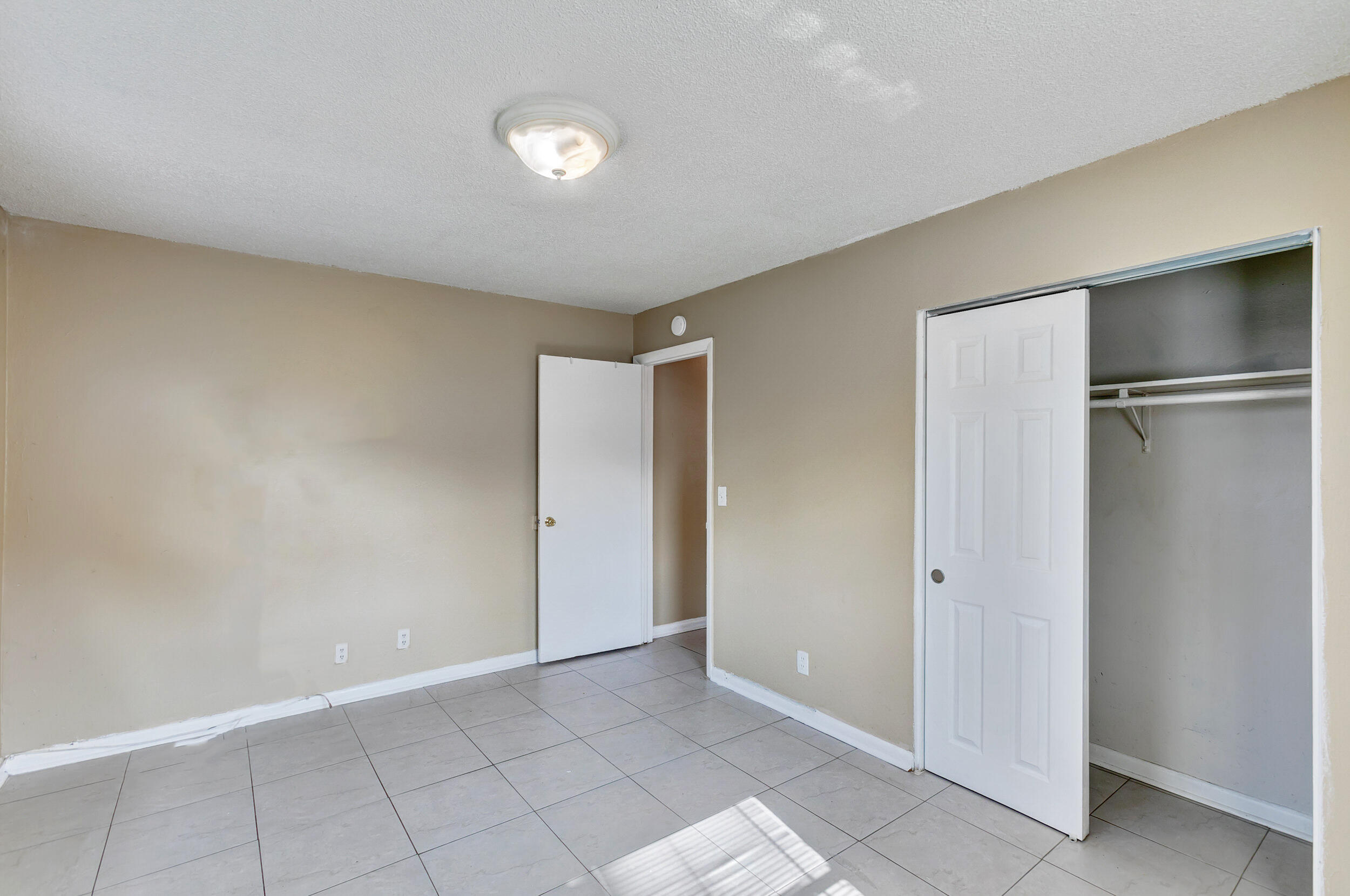 461 Silver Beach Road, Unit 1 Riviera Beach, FL 33403 - Photo 21 of 35 a view of an empty room