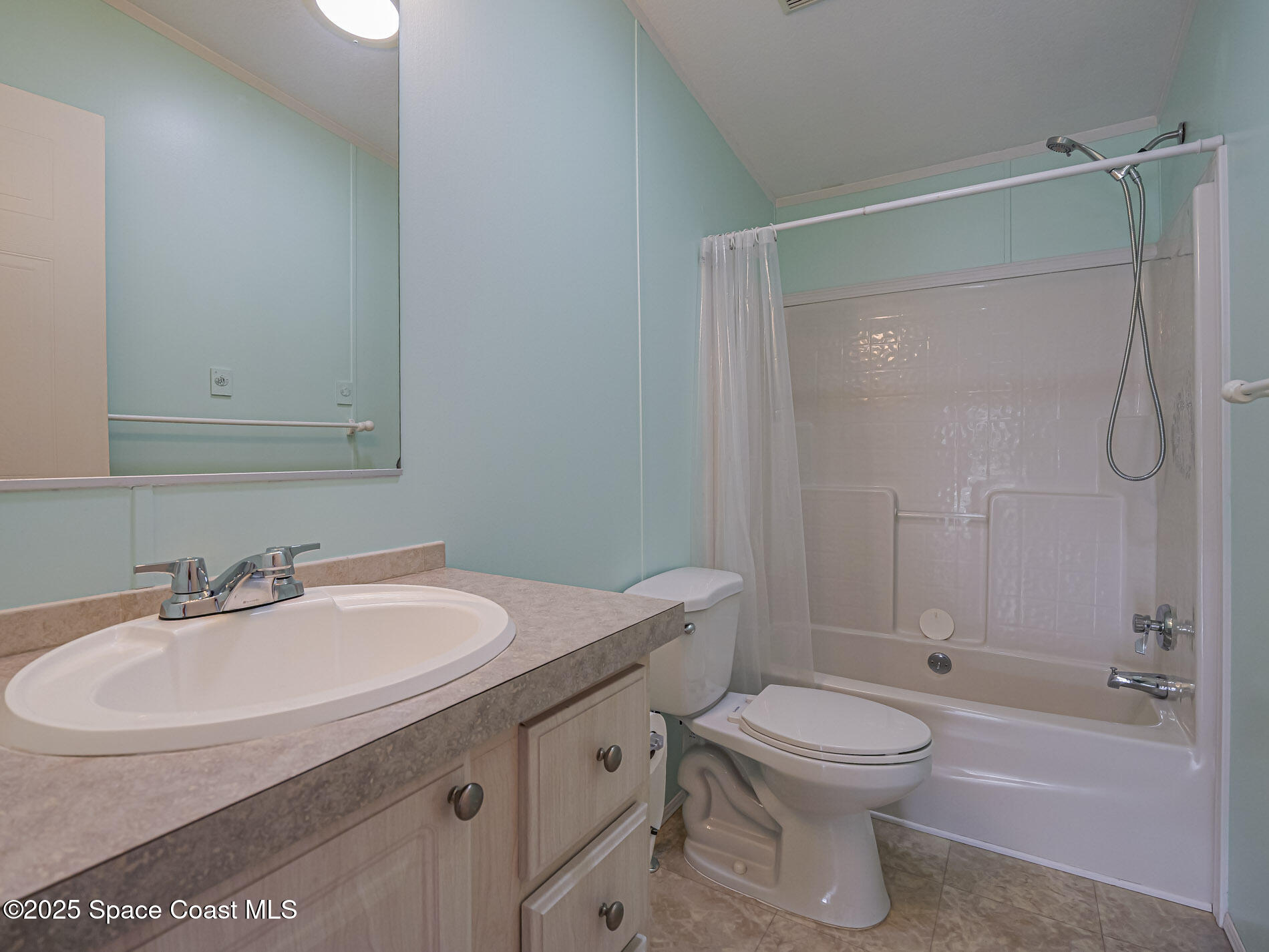 7620 Boxelder Road Micco, FL 32976 - Photo 27 of 47 a bathroom with a sink a toilet and shower