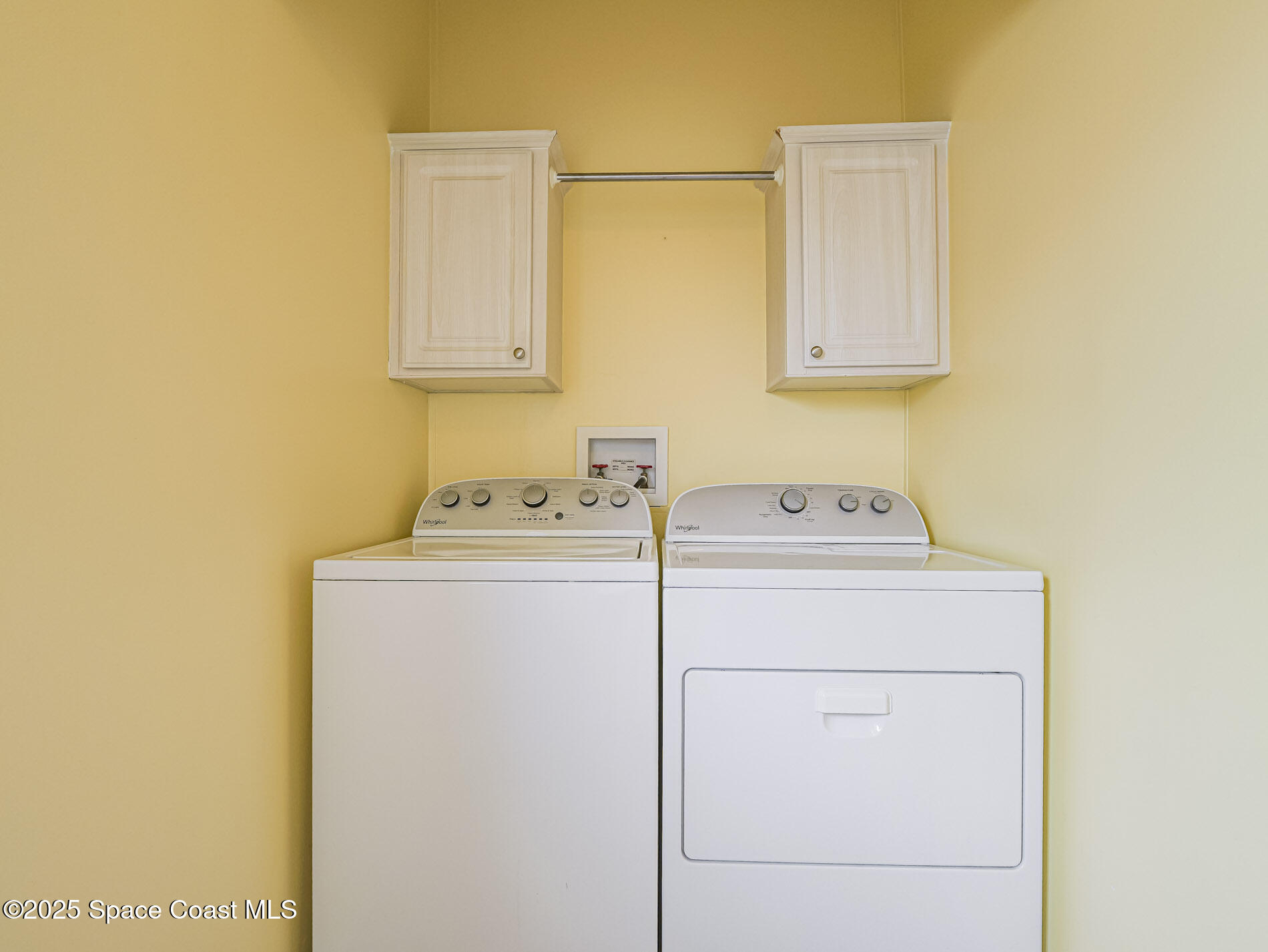 7620 Boxelder Road Micco, FL 32976 - Photo 31 of 47 a utility room with dryer and washer