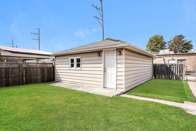 a front view of a house with yard