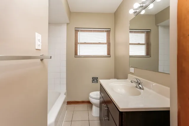 a bathroom with a sink and a toilet