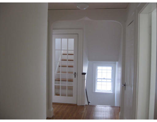 27 Algonquin Road Newton, MA 02467 - Photo 16 of 20 a view of wooden floor in a room