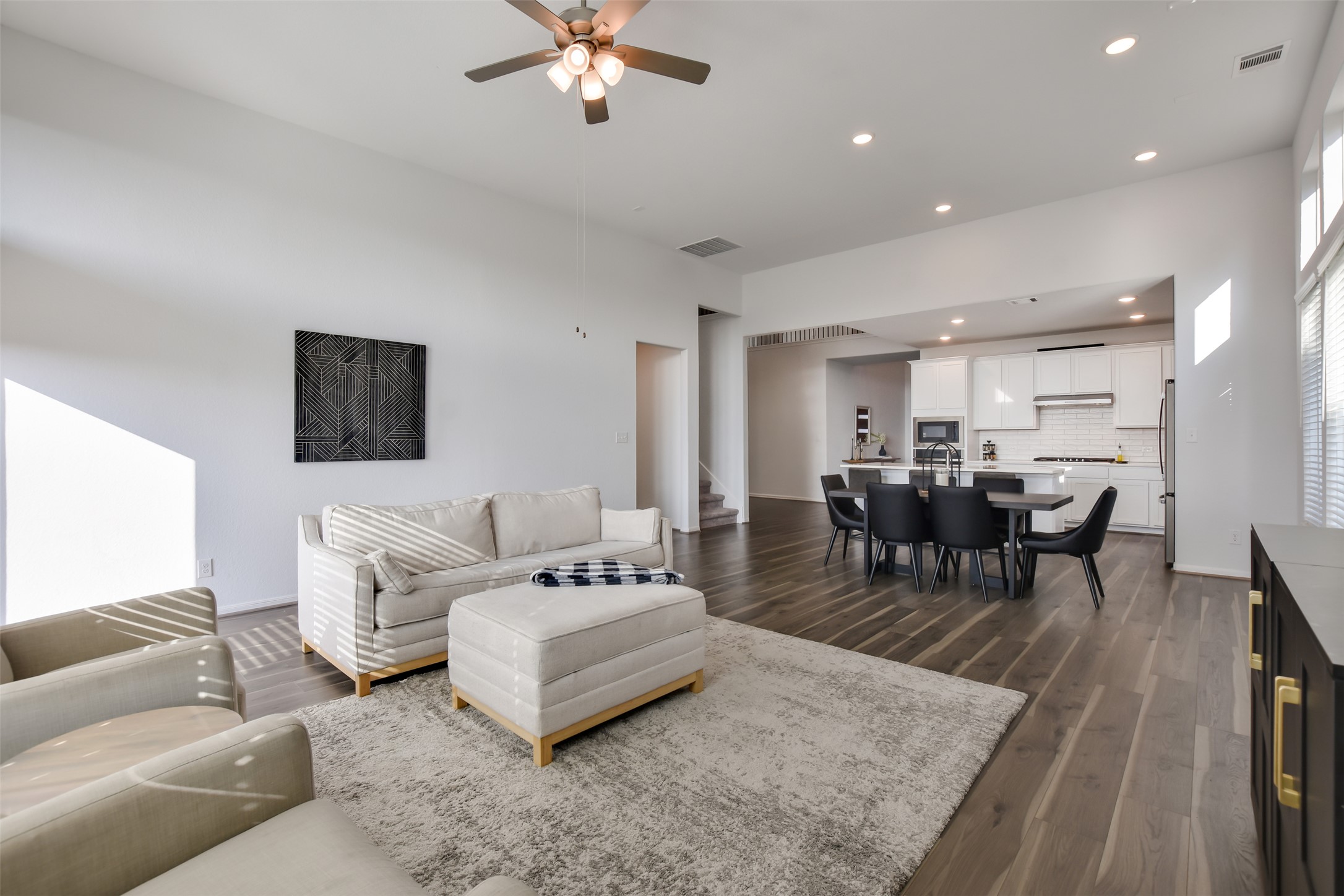 605 Oleander Loop Buda, TX 78610 - Photo 8 of 32 a living room with furniture and a dining table