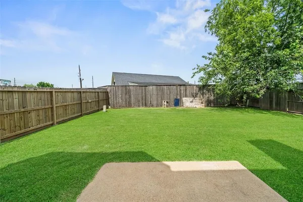 a view of a backyard with a garden