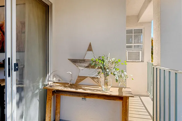 a vase of flowers sitting on a table