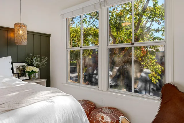 a bathroom with a toilet a sink and a mirror