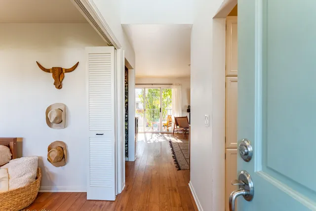 a view of a hallway and interior of the house