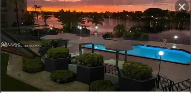 a view of a street with sitting area