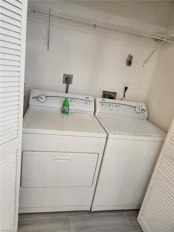 650 103rd Avenue North Naples, FL 34108 - Photo 13 of 13 a utility room with dryer and washer
