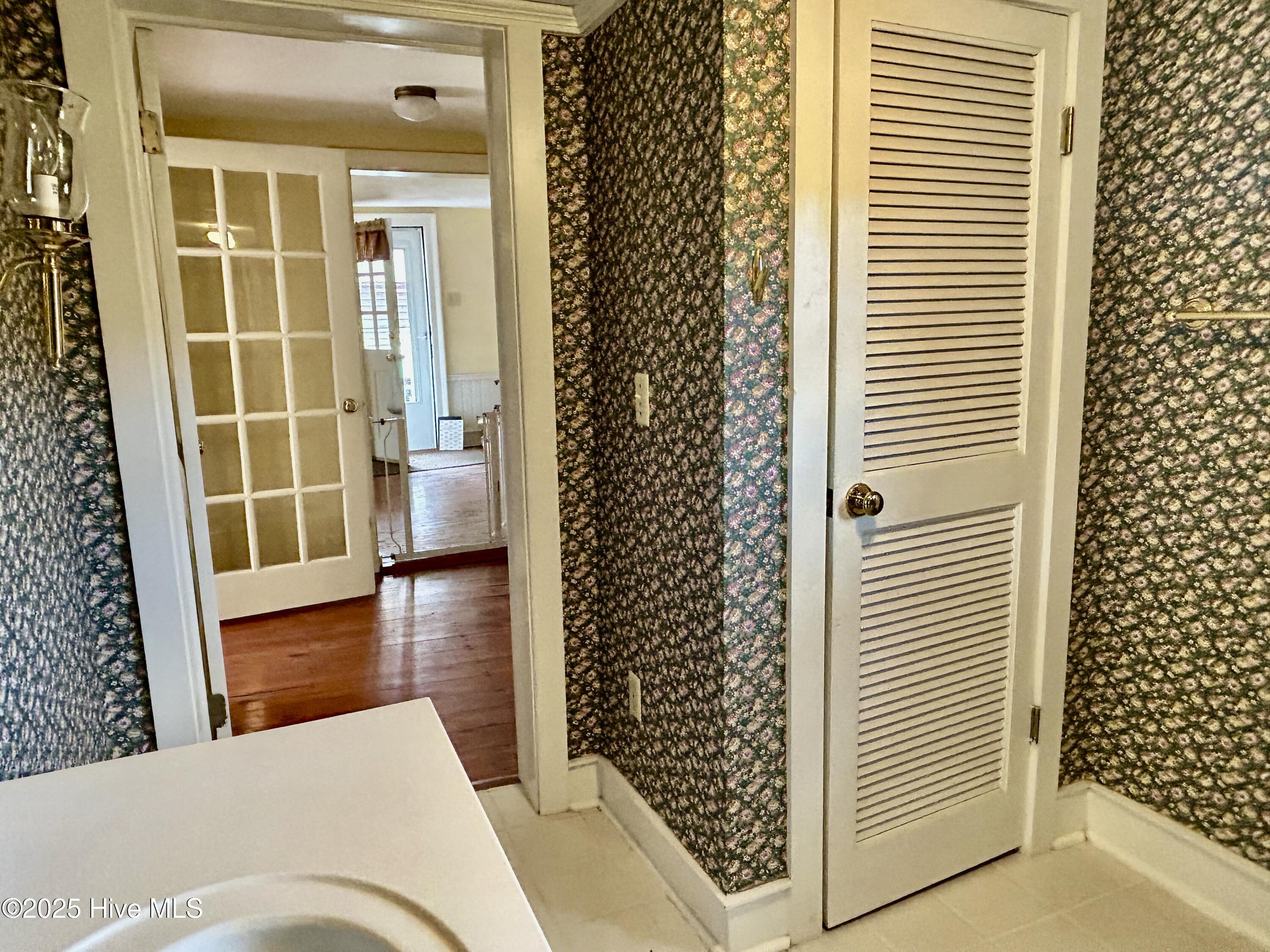 248 Highway 305 Windsor, NC 27983 - Photo 32 of 57 downstairs bath storage and view to back hall