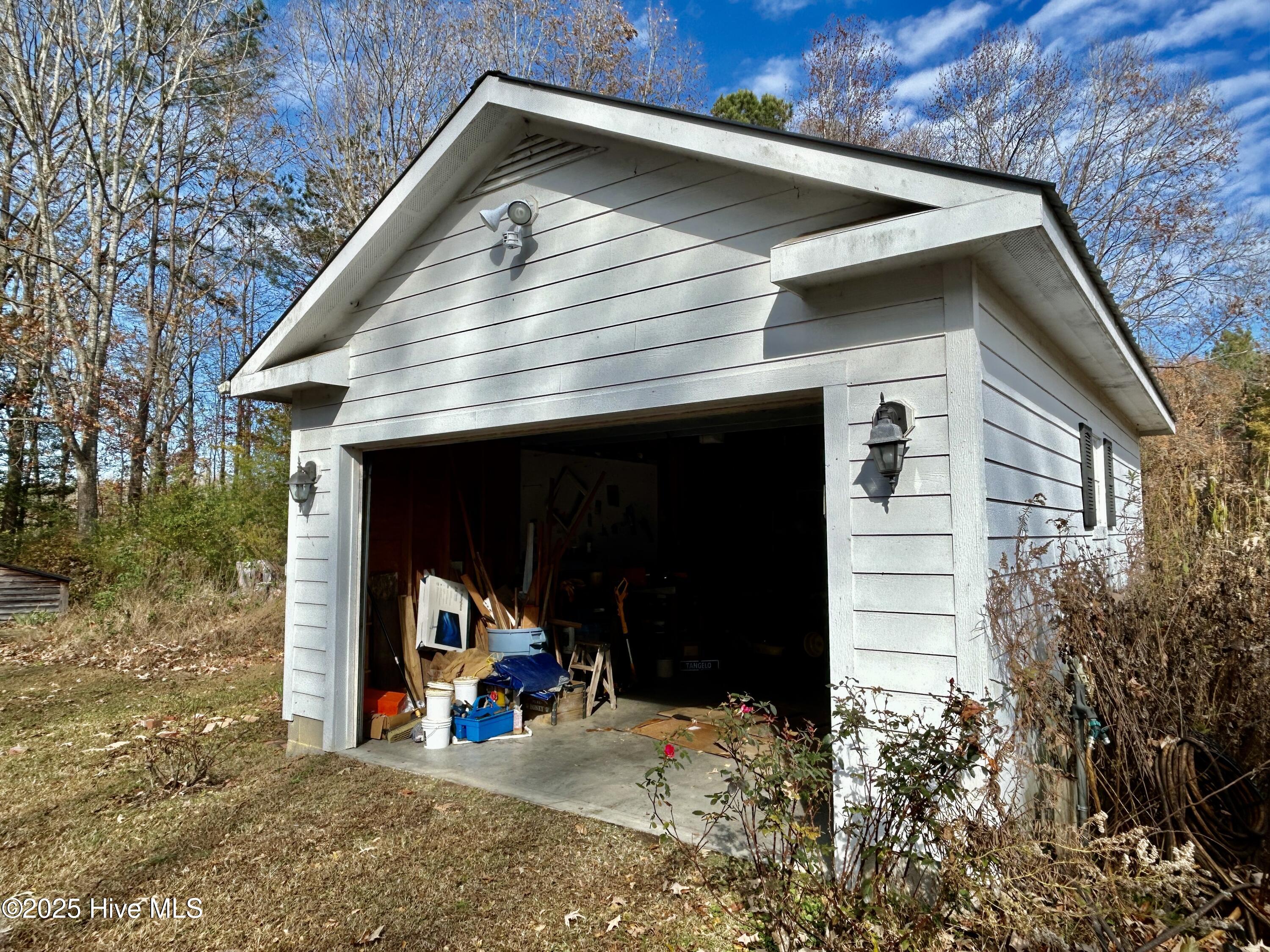 248 Highway 305 Windsor, NC 27983 - Photo 51 of 57 garage door is open