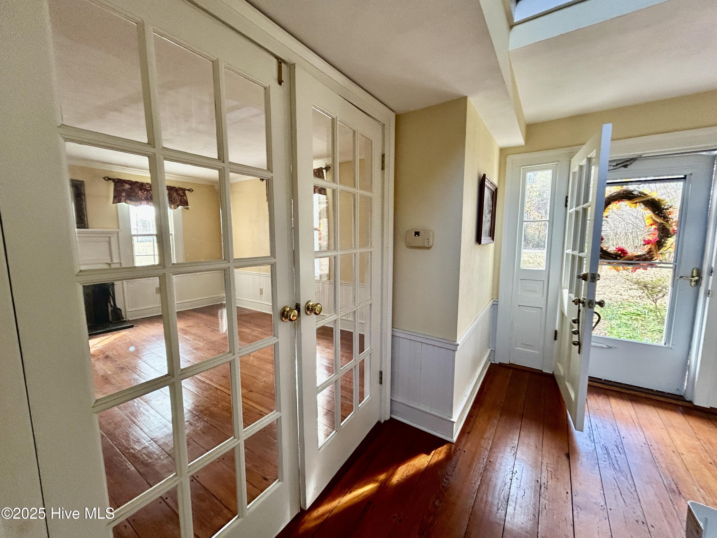 248 Highway 305 Windsor, NC 27983 - Photo 9 of 57 foyer view of living room French doors