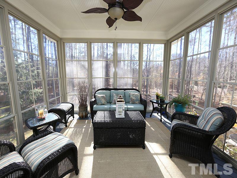 12913 Baybriar Drive Raleigh, NC 27613 - Photo 22 of 25 a living room with furniture and a large window