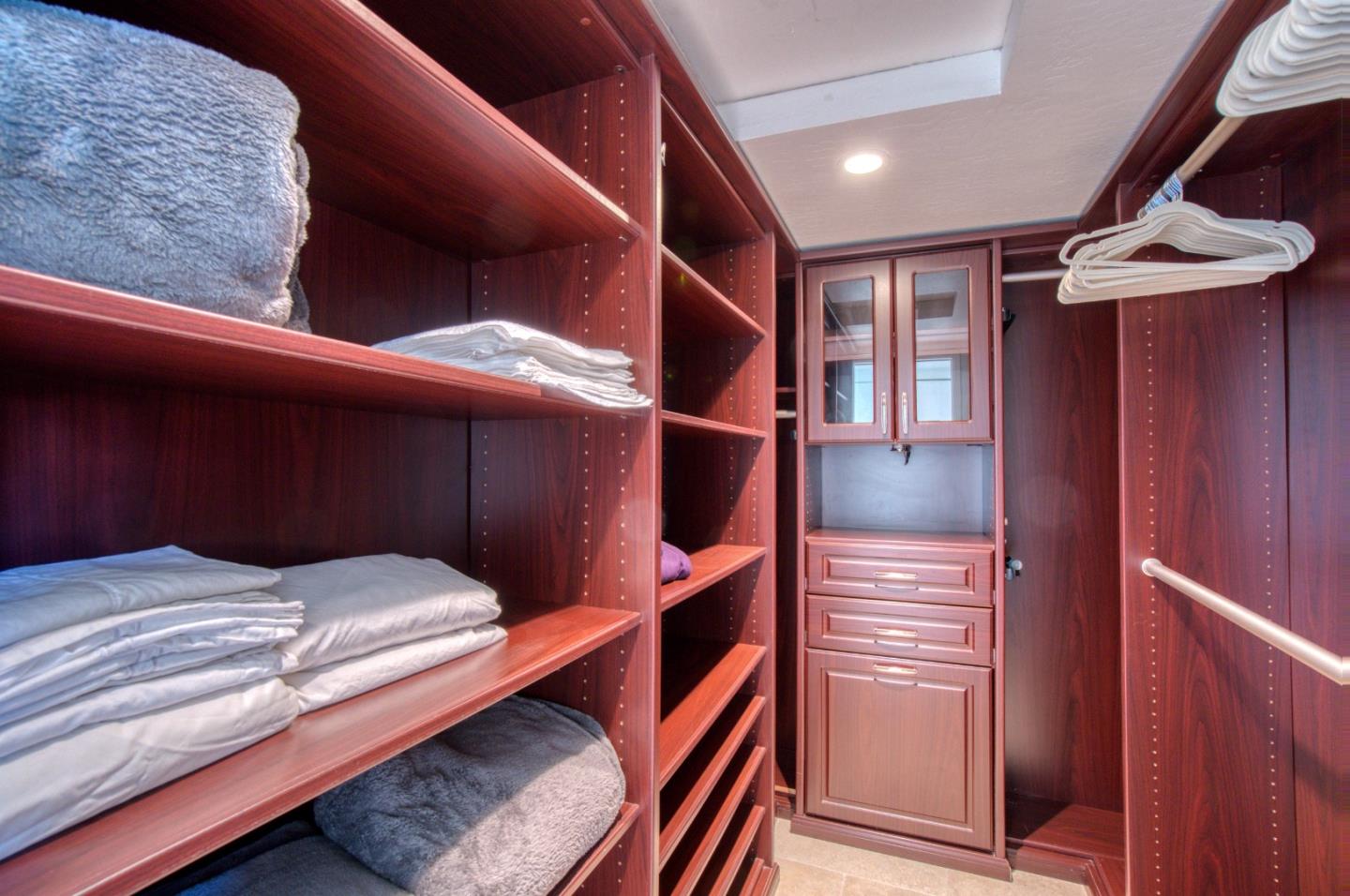 191 Reef Point Road Moss Beach, CA 94038 - Photo 16 of 41 a bedroom with a bunk bed and a dresser