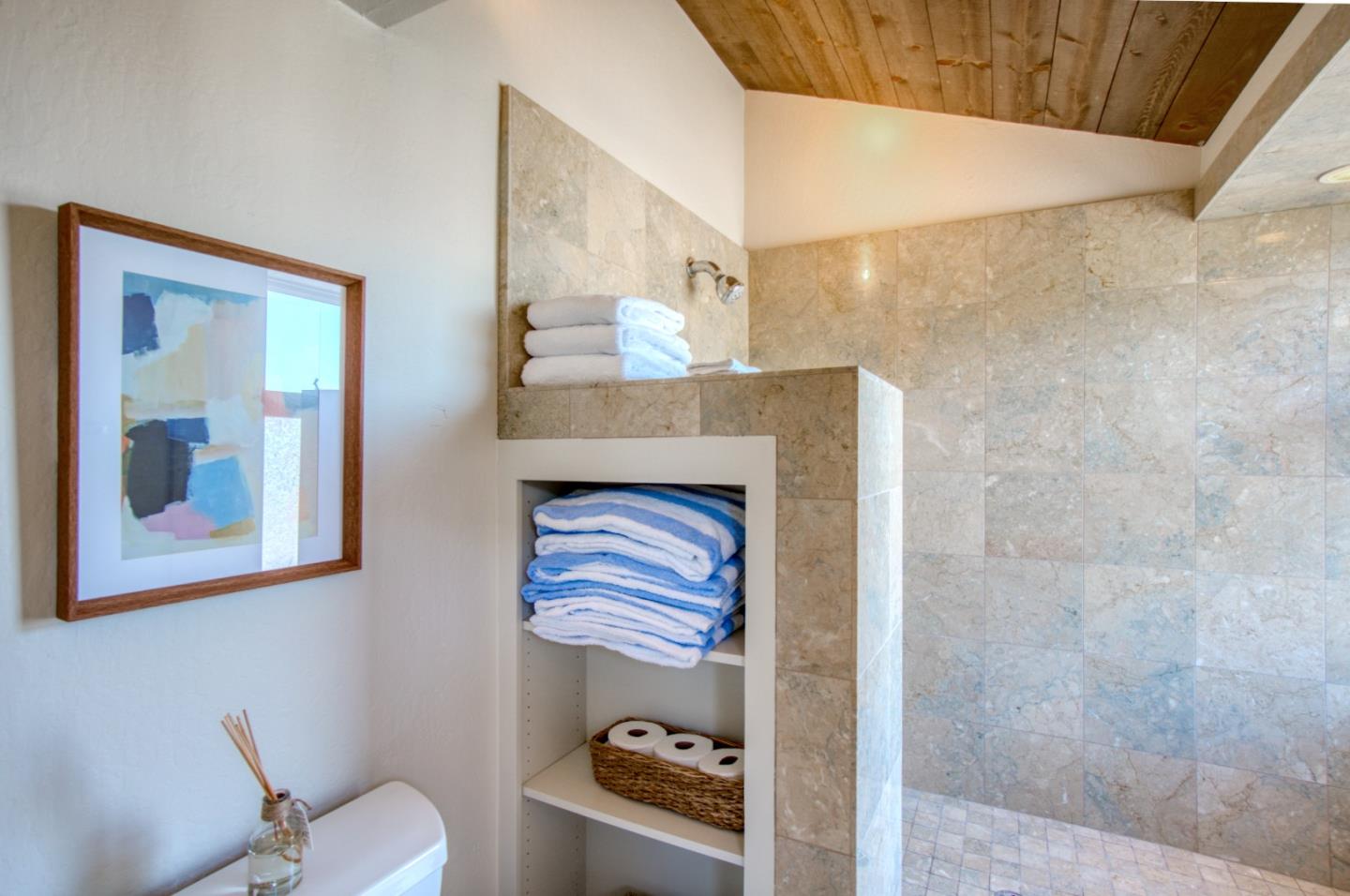 191 Reef Point Road Moss Beach, CA 94038 - Photo 17 of 41 a bathroom with a sink and a mirror