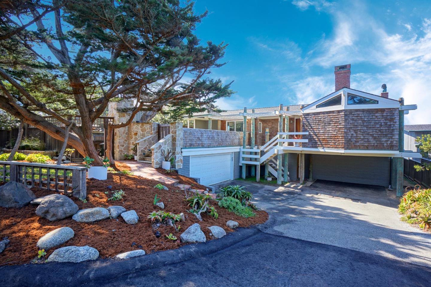 191 Reef Point Road Moss Beach, CA 94038 - Photo 2 of 41 a view of a chairs and tables in the patio