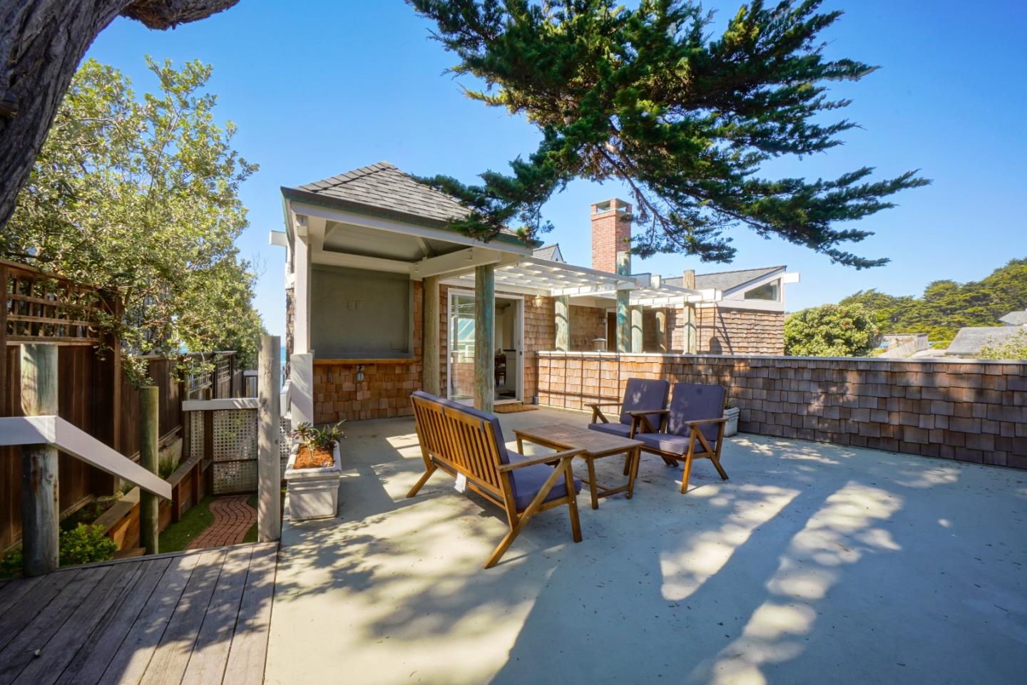 191 Reef Point Road Moss Beach, CA 94038 - Photo 3 of 41 a house view with a sitting space and garden space