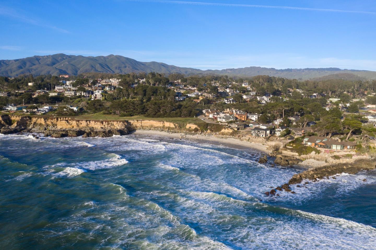 191 Reef Point Road Moss Beach, CA 94038 - Photo 41 of 41 a view of lake with mountain